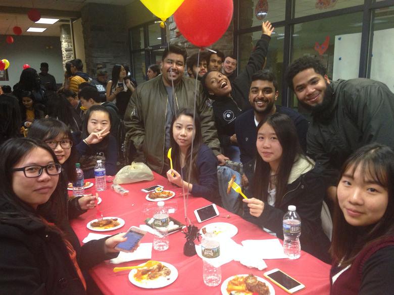 Students smiling for group photo at Penn State Abington Lions Gate Event near Philadelphia